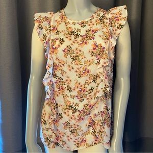 Atmosphere peach floral top in GUC.  Size 10US